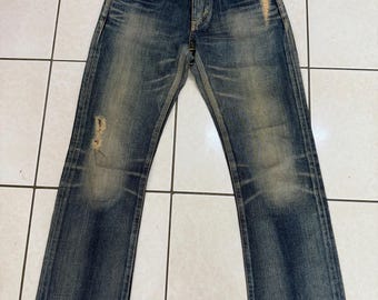 Jeans de mezclilla acampanados estilo garra desgastados Edwin Lot 503 para mujer, estilo vintage.