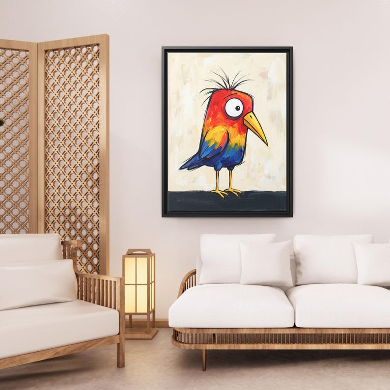 May include: A framed wall art print featuring a stylized, colorful bird with a bright red head, yellow neck, and blue wings. The bird has a large white eye, a yellow beak, and spiky black feathers on its head, standing on a dark horizontal line.