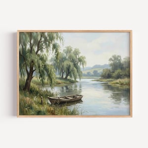 May include: A landscape painting featuring a wooden rowboat moored at the grassy bank of a calm river. Large weeping willow trees with drooping green foliage line the shore, while soft rolling hills appear in the distant background under a pale sky.