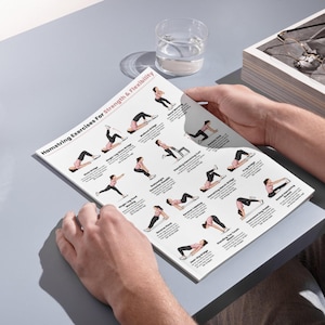 May include: A white instructional poster titled Hamstring Exercises For Strength & Flexibility, featuring multiple illustrations of a person in pink and black athletic wear performing various exercises with descriptive text labels for each movement.