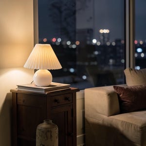 May include: A rustic wooden sign with the text "Welcome to our home" in white lettering. The sign features a distressed finish and a simple, inviting design, perfect for a front porch or entryway.