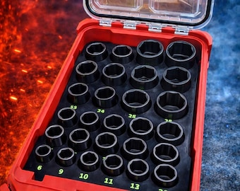 May include: A red Milwaukee Packout case containing a black foam insert organized for a Shockwave 1/2 inch drive metric socket set. The foam features cutouts for various socket sizes, with green numerical labels printed below each slot.