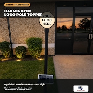 May include: A solar-powered illuminated logo pole topper featuring a circular white display area with the text YOUR LOGO HERE. The unit is mounted on a black pole and includes a rectangular solar panel attached to the post for power.