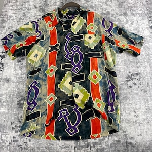 May include: A handmade wooden sign with the text "Welcome" in a playful font. The sign is painted white with a distressed finish, and features a decorative floral design in shades of pink and green. It measures approximately 12 inches wide.