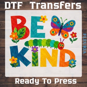 May include: A DTF transfer sheet featuring the text BE KIND in large, colorful, textured letters. The design includes a multi-colored butterfly, a green caterpillar, and various small flowers. The text DTF TRANSFERS and Ready To Press is visible.