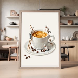 May include: A framed wall art print featuring a white ceramic coffee cup on a saucer filled with latte art. Three miniature figures dressed as chefs in white uniforms and hats are interacting with the cup, using wooden ladders and spoons.