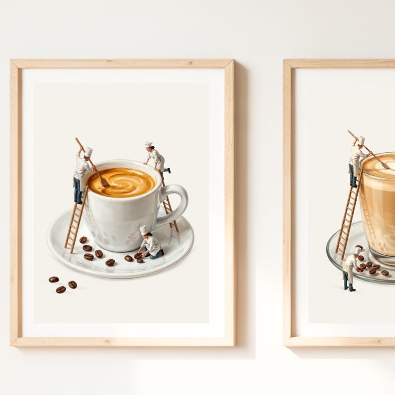 May include: Two framed wall art prints featuring miniature chefs in white uniforms interacting with large coffee cups. One print shows chefs stirring a cup of espresso with ladders and coffee beans, while the other shows a latte with a chef on a ladder.