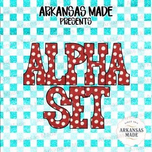May include: A digital graphic featuring the text ARKANSAS MADE PRESENTS ALPHA SET in black, bold lettering. The words ALPHA SET are rendered in a red font with white polka dots. The background is a repeating pattern of light blue and white squares.