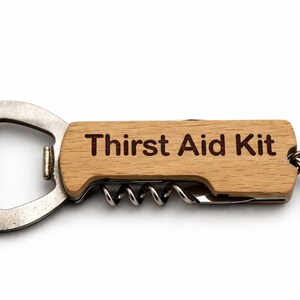 May include: A set of three ceramic mugs with a speckled, matte finish. The mugs are in shades of cream, light gray, and dark gray. Each mug has a simple, minimalist design and a rounded handle.