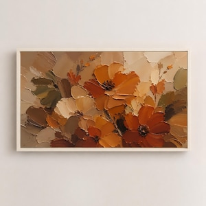 May include: A rectangular framed painting featuring a thick impasto floral arrangement in shades of burnt orange, ochre, cream, and muted olive green. The textured oil paint creates visible brushstrokes and depth across the entire canvas surface.