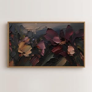 May include: A rectangular framed oil painting featuring thick, textured impasto brushstrokes in a dark colour palette. The composition displays abstract floral shapes in deep shades of burgundy, muted gold, charcoal grey, and soft beige tones.