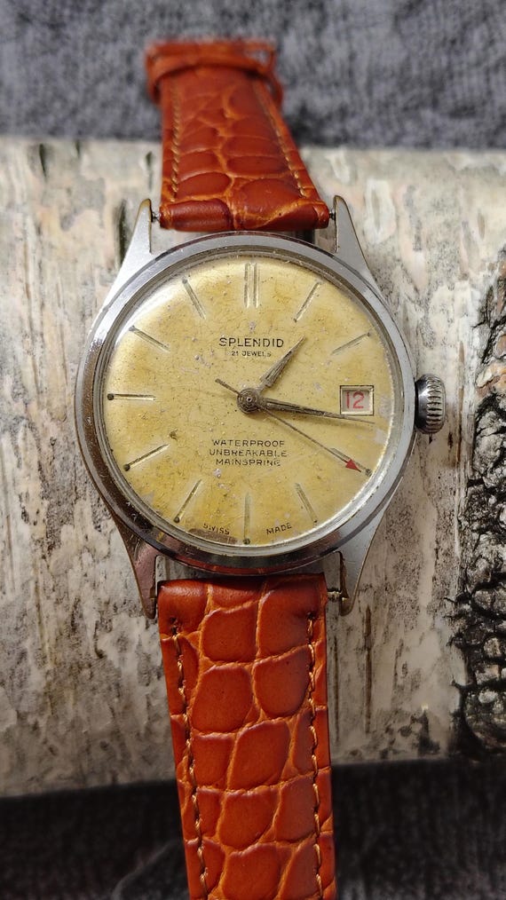 Splendid unique, 21 rubis, vintage 1960, mécanique, calendrier, cadran patiné par le temps.