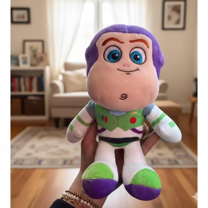 May include: A plush Buzz Lightyear doll, featuring a purple head, blue eyes, and a green and white spacesuit. The doll has a friendly expression and is made of soft, cuddly materials. A fun toy for kids and collectors.