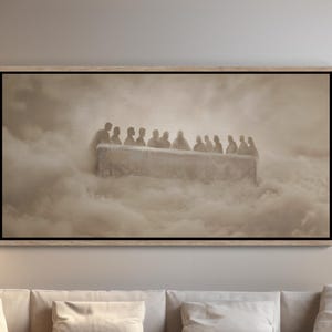 May include: A rectangular wall art print featuring a sepia-toned depiction of a group of thirteen figures seated at a long table, appearing to float amidst a dense layer of clouds, enclosed within a simple light-coloured wooden frame.