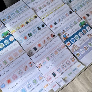 May include: A collection of personalized children's routine charts featuring various names like Anna, Max, and Mia. Each chart includes colorful icons for morning and evening tasks such as brushing teeth, getting dressed, and eating meals, with interactive tabs labeled to do.