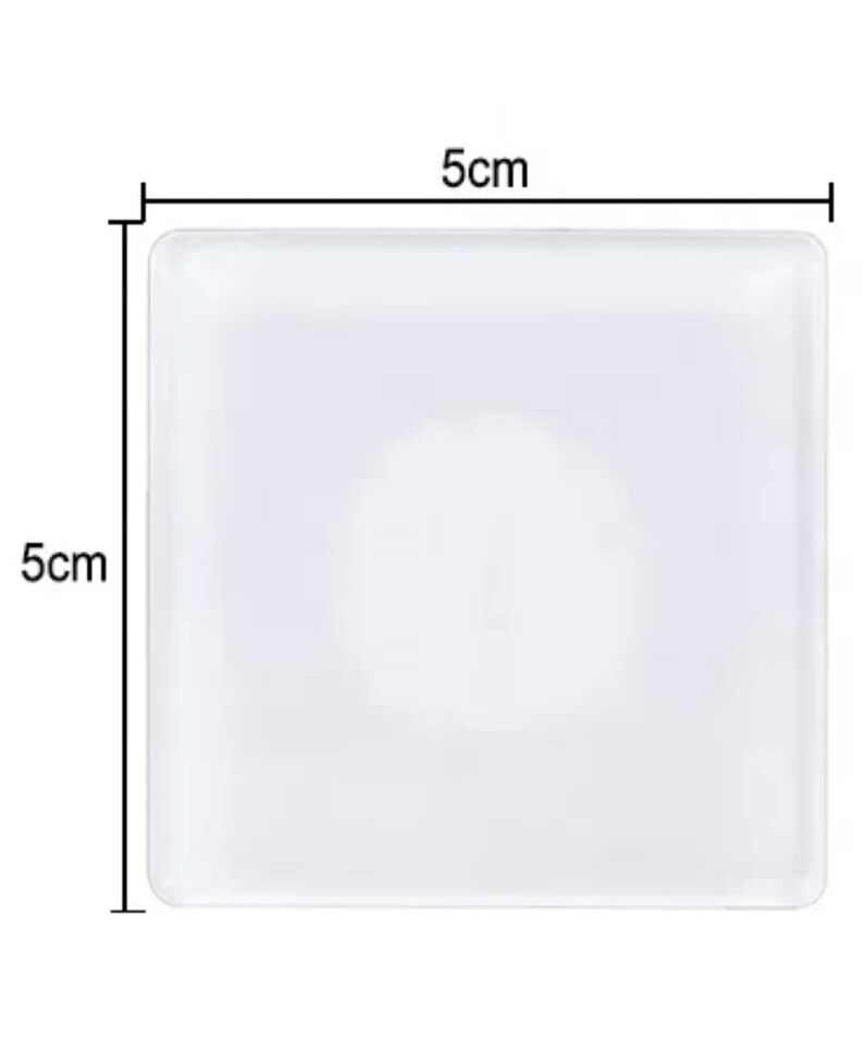 May include: A white square-shaped plate with a smooth surface. The plate measures 5 inches by 5 inches.