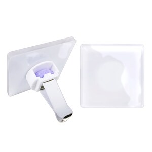 May include: White car air freshener with a purple scented disc. The air freshener has a clip to attach to a vent.