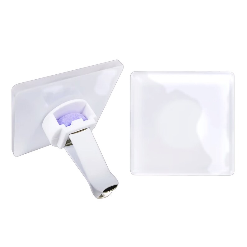 May include: White car air freshener with a purple scented disc. The air freshener has a clip to attach to a vent.