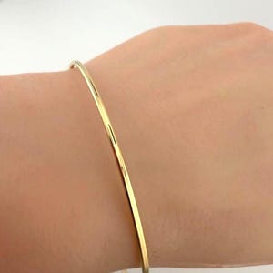 Bransoleta minimalistyczna cienka 1,5 mm ze złota 14 K, 7,25 cala