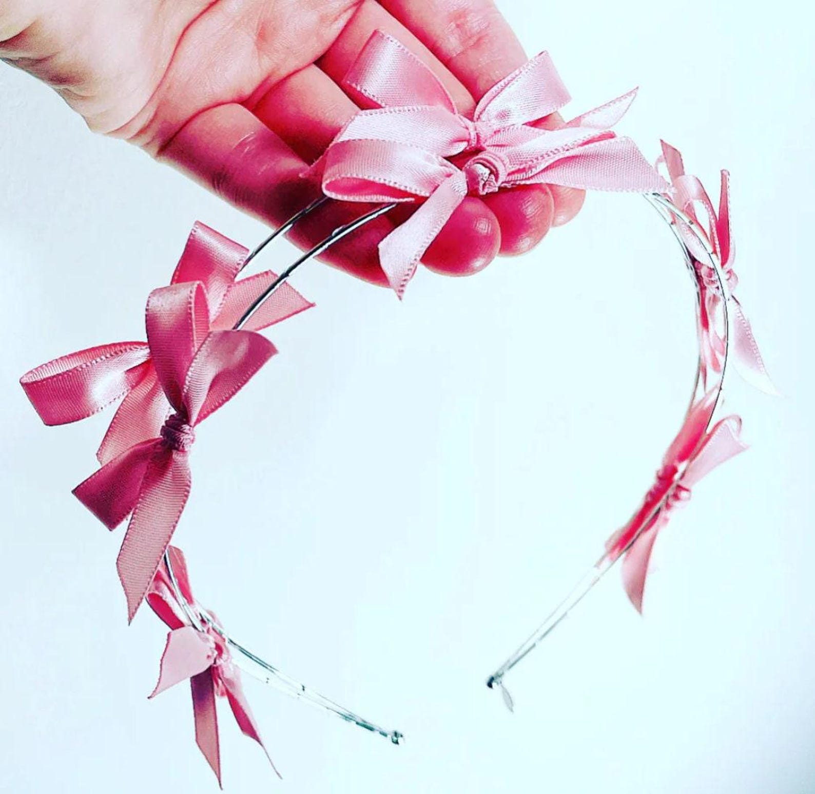 Red Bow Headpiece in Premium Straw