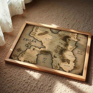 Vintage style fantasy map printable wall art of a mythical continent with detailed kingdoms and mountains. Aged parchment paper look, perfect for dark academia decor and book lovers room styling.