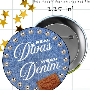 May include: A round button pin with a denim-like background and the text "REAL Divas WEAR Denim." The pin is 2.25 inches in diameter and features silver studs around the edge and a Levi Strauss & Co. patch.