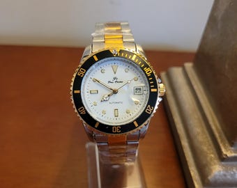 Brandneue zweifarbige automatische Herrenuhr mit schwarz-goldener Lünette