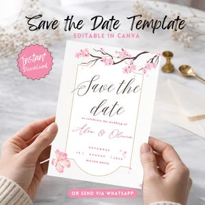 Könnte beinhalten: Eine weiße Hochzeitseinladung mit dem Text "Save the Date" und floralen Akzenten. Die Einladung enthält die Namen "Alex & Olivia", Datum und Ort. Die Worte "Sofort-Download" sind ebenfalls sichtbar.