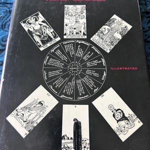 May include: A black hardcover book titled A Complete Guide to the Tarot by Eden Gray. The cover features a central circular astrological chart surrounded by six black and white tarot card illustrations including The Devil, Judgement, and Temperance.
