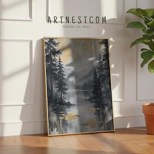 May include: A framed art print featuring a landscape scene with a lake, trees, and mountains. The artwork is primarily in shades of gray and black, with gold accents. The text "ARTNESTCOM Printable Art Images" is at the top.