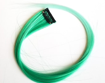 Pastel green ombre hair extension clip in