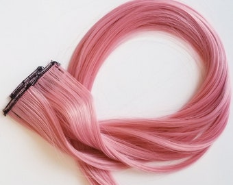 Pastel dusty rose pink hair extension clip in