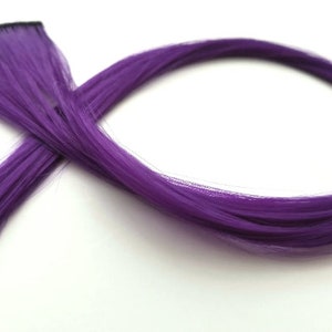 Royal purple hair extension clip in