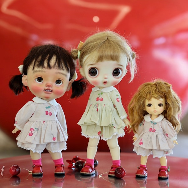 It’s cherry set for doll please choose size of your doll