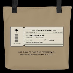 May include: Tan tote bag with black handles featuring a boarding pass design. The pass reads "Green Gables" and "Anne Shirley." The quote "Isn't it nice to think that tomorrow is a new day with no mistakes in it yet?" is printed below.