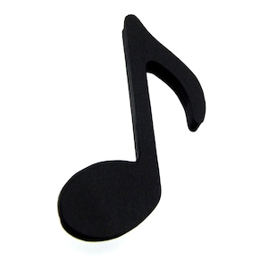 May include: A black musical note cutout, a common symbol for music and sound.