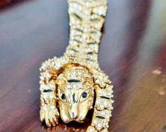 Vintage gold plated tiger brooch.