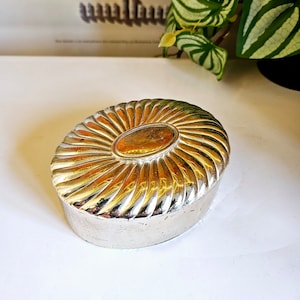 Vintage silver plated oval jewellery box.