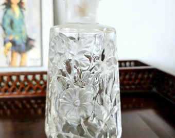 Vintage frosted glass perfume bottle.