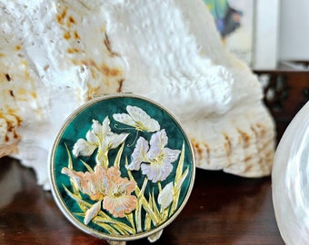 Vintage metal pill box with embossed iris flowers