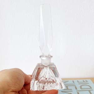Vintage clear glass perfume bottle.
