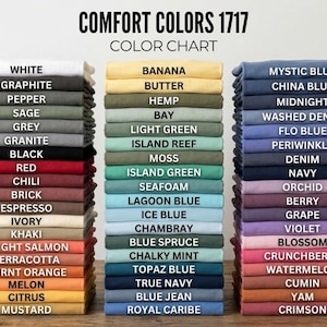 May include: Color chart displaying stacks of folded t-shirts in various colors, including white, black, red, and blue. The text "COMFORT COLORS 1717 COLOR CHART" is at the top, with color names like "Graphite" and "Mustard" listed.