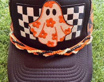 Ghost with floral sheet on custom mesh trucker hat with braided hat chain