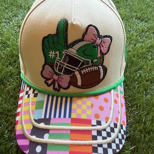Girlie Football Themed embroidered patch on a custom canvas trucker hat with cute brim
