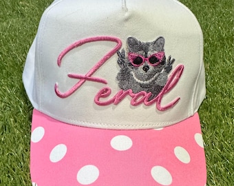 Feral raccoon on pink polka dot canvas trucker hat