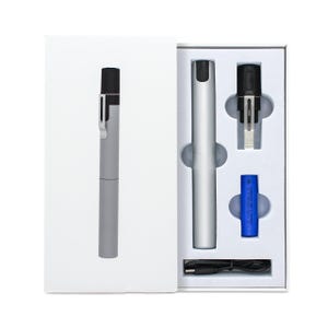 May include: A silver cylindrical flashlight with a black cap and metal clip, presented in a white box. The set includes the flashlight, a detachable black cap with a clip, a blue cylindrical battery, and a black USB charging cable.