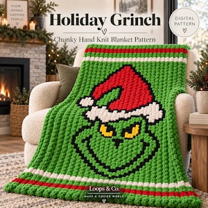 May include: A chunky hand-knit blanket featuring a green character face with yellow eyes and a red Santa hat. The blanket has white and red stripes at the top and bottom edges. Text on the image reads Holiday Grinch, Chunky Hand Knit Blanket Pattern, Digital Pattern, and Loops & Co. Make a Cozier World.