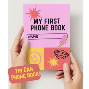 May include: A pink "My First Phone Book" with a name field, lightning bolt, and starburst graphic. The bottom section has a yellow square with a smiley face and a red square with lips and a starburst. A red rectangle reads "TIN CAN PHONE BOOK!"