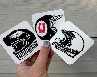 Mini láminas del trío de cascos