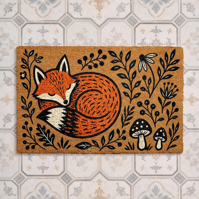 A decorative door mat with a fox curled up and surrounded by various plants and mushrooms.